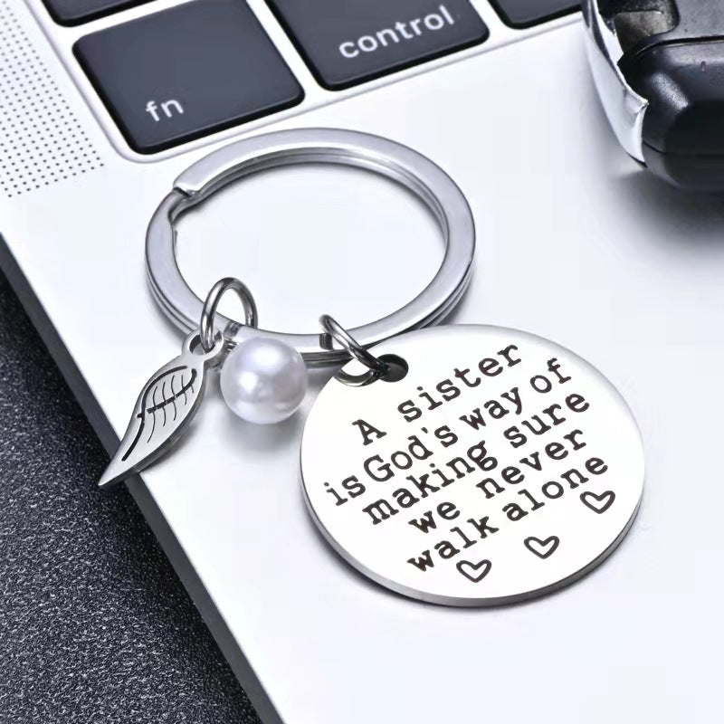 A Sister is God's Way of Making Sure We Never Walk Alone Keychain Keychain GrindStyle 