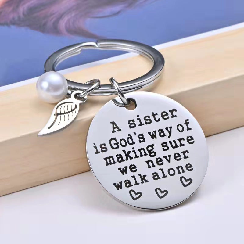 A Sister is God's Way of Making Sure We Never Walk Alone Keychain Keychain GrindStyle 